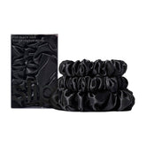 SLIP serre-cheveux noir midi et grande en soie, texture lisse pour coiffage sans tiraillement.