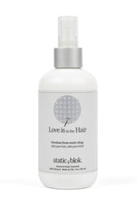 Static Blok bouteille anti-statique sur cheveux, réduction des frisottis durable.