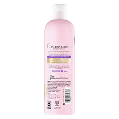 Texte alt: Suave Conditionneur avec complexe d'acides aminés pour boucles douces et gérables.