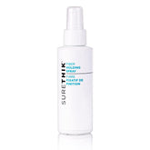 Surethik spray maintien-fibres : bouteille citron léger pour une tenue fiable.