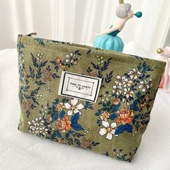 SxoSyo sac maquillage en matière durable et facile à nettoyer.