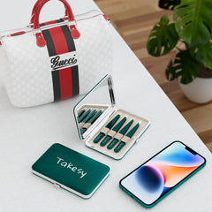 Set pinces Takesy pour voyage avec miroir intégré.