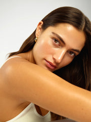 Tan-Luxe The Butter – effet nacré lumineux qui sublime la peau.
