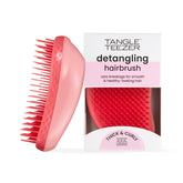 Brosse démêlante Tangle Teezer Original démêlant les cheveux secs et humides avec douceur.
