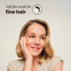 Brosse Tangle Teezer Original Detangler, design palm pour une prise en main confortable.