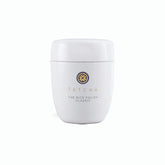 TATCHA Polissage au Riz Classique — bouteille élégante pour exfolier en douceur et révéler l'éclat.
