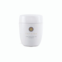 TATCHA Polissage au Riz Classique — bouteille élégante pour exfolier en douceur et révéler l'éclat.