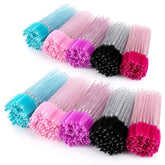 Brosse mascara jetable Tbestmax rose pour précision des cils.