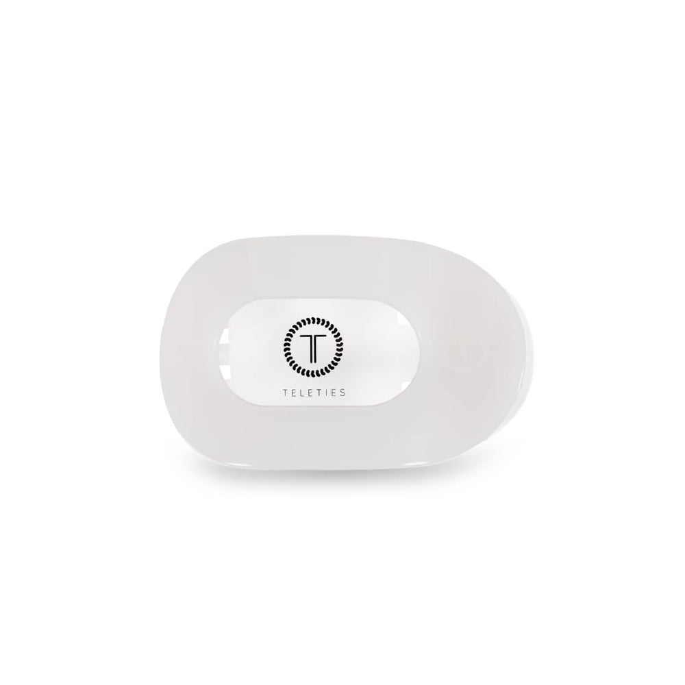 Teleties, petite pince ronde plate, offre une prise forte pour cheveux fins.