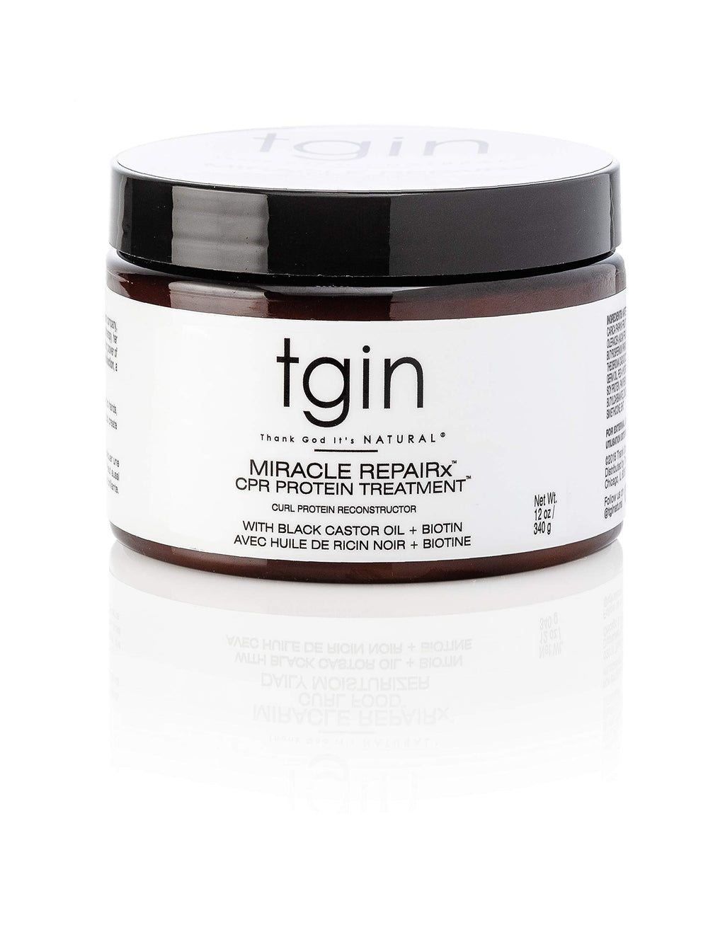 Bouteille tgin Miracle RepaiRx, soin protéiné pour cheveux bouclés, renforce les mèches.