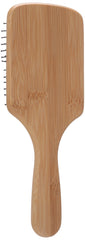 The Body Shop brosse cheveux bambou distribue huiles naturelles pour des longueurs brillantes.