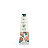 La crème mains The Body Shop, texture légère pour hydratation rapide.