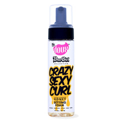 The Doux crème-boucles application montre l’application facile et définit les boucles.