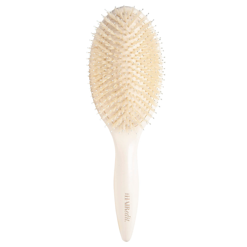 The Hair Edit brosse-poils-sanglier accroît la brillance et la douceur des cheveux.