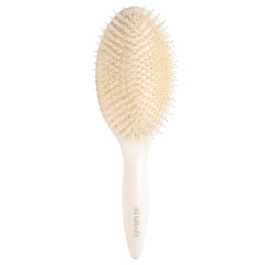 The Hair Edit brosse-poils-sanglier accroît la brillance et la douceur des cheveux.