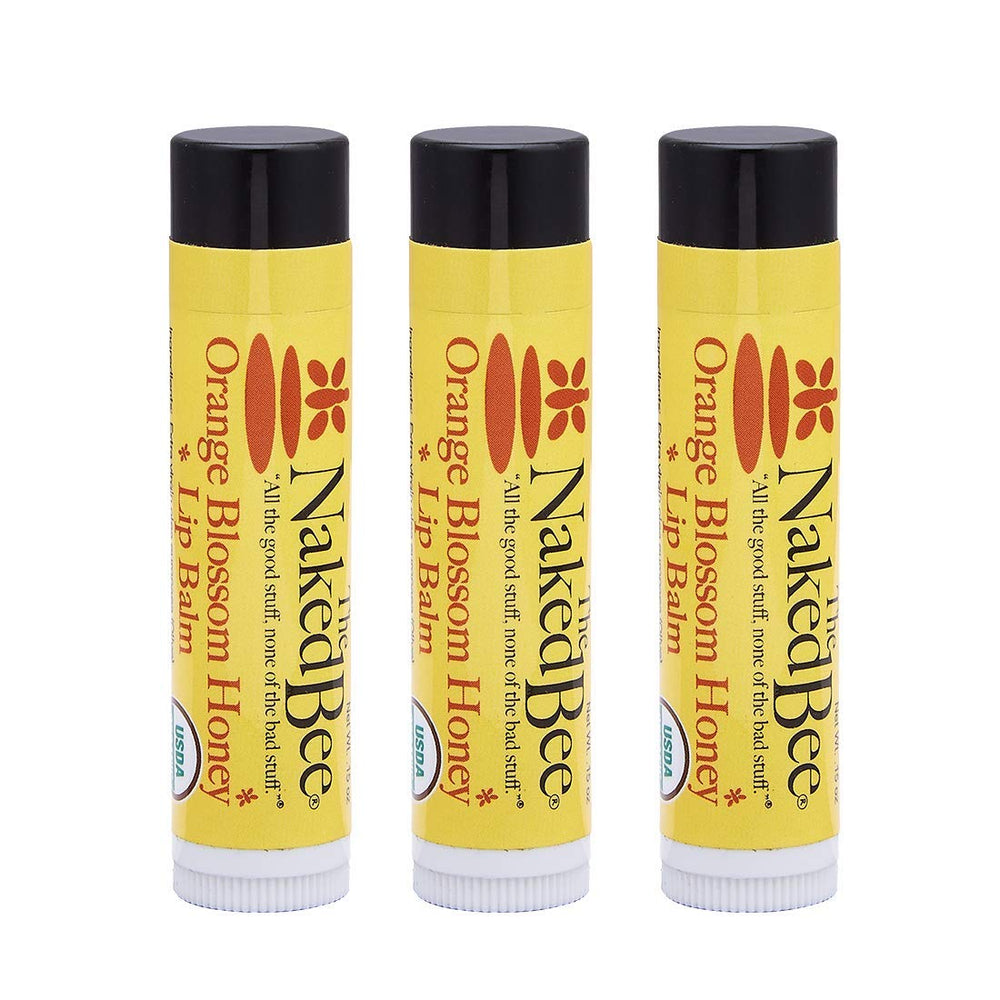 The Naked Bee Organic Orange Blossom Honey Lip Balm 3-Pack nourishes lips with natural oils.