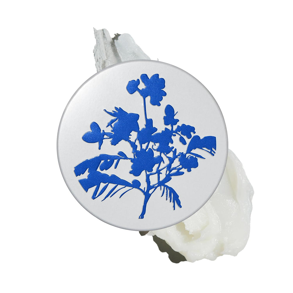 The Outset Barrière Botanique Rescue Balm emballage, soin pratique en déplacement.