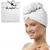 THE PERFECT HAIRCARE serviette microfibre absorbante après douche pour séchage rapide.