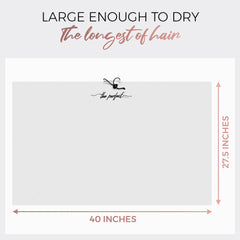 THE PERFECT HAIRCARE wrap pour cheveux longs et bouclés offre un séchage en douceur.