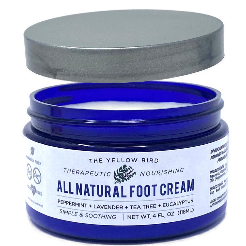 The Yellow Bird tea tree foot cream bottle pump for easy, deep moisture.