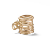 The Hair Edit clip-cuff doré enveloppant la queue de cheval, allure chic et rapide.