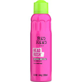 TIGI Bed Head Headrush Shine Spray can releasing a fine mist for glossy hair