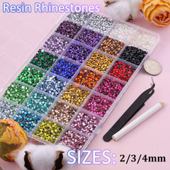 Pinces TINKRSTUFF pour saisir les strass et les poser avec précision.