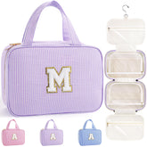 TOPEAST sac de toilette suspendu violet avec initiales, pratique pour un rangement personnalisé en voyage.