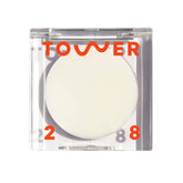 Baume SuperDew Tower 28, texture claire, pour un éclat naturel sans paillettes.