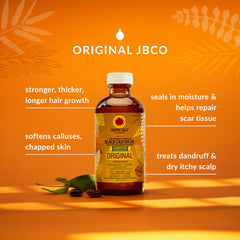 Application cheveux montrant brillance naturelle avec l'huile ricin Tropic Isle Living.