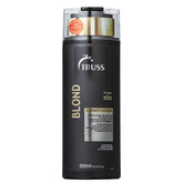 TRUSS Blond Conditionneur violet, bouteille visible pour neutraliser les tons jaunes.