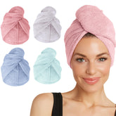 Turbie Twist: essuie-cheveux microfibre rose pour un séchage rapide et doux.