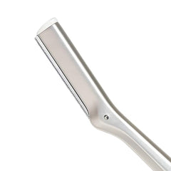 Tweezerman rasoir visage inox, manche ergonomique pour une prise en main comfortable.
