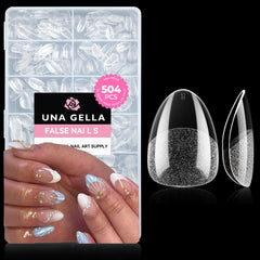 UNA GELLA tips transparents en amande extra-court pour un look naturel.
