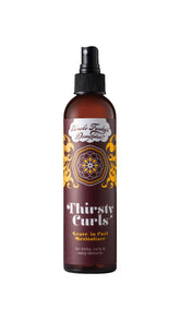 Uncle Funky's Daughter Thirsty Curls Leave-In, bouteille hydratante qui réveille les boucles.
