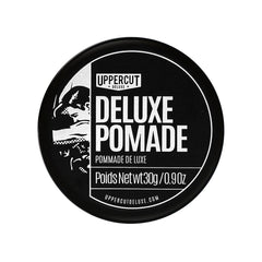 Pomade Uppercut Deluxe en bouteille avec tenue forte et brillance naturelle.