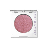 URBAN DECAY Bad Seed, rose scintillant sur paupière, pigmentation élevée et tenue durable.