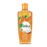 Vatika Naturals Dabur huile capillaire dans une bouteille, douceur et brillance visibles