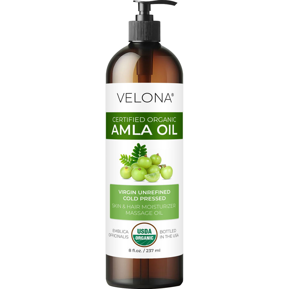 Velona Amla huile - bouteille qui verse, hydratation capillaire en douceur.