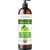 Velona Amla huile - bouteille qui verse, hydratation capillaire en douceur.