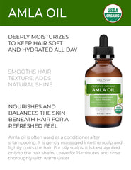 Texture soyeuse de l'huile Velona Amla pour des soins capillaires quotidiens.