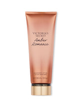 Victoria's Secret Amber Romance Nourishing Lotion bottle showing quick-dry hydration for hands and body
