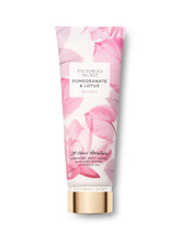 Victoria's Secret Pomegranate & Lotus 8oz bottle for daily hydration and scent.