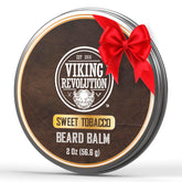 Baume à barbe Viking Revolution Sweet Tobacco en bouteille, parfum doux pour nourrir la barbe.