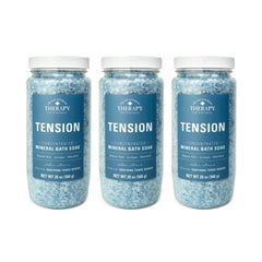 Village Naturals Therapy Bains Minéraux Tension, bouteille visible, parfum cédré-citron apaisant.