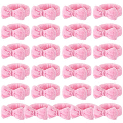 Bandeau visage Wavyknot rose corail, idéal pour le soin du visage.