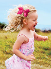 Wee Ones rose clair, accessoire délicat pour cheveux fins et doux.
