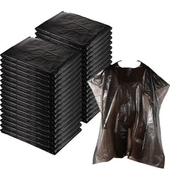 Cape WILLBOND jetable noire couvrant parfaitement les vetements lors d'une coupe.
