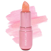 Baume Winky Lux Pink Opal Glimmer avec cap élégant et application précise.