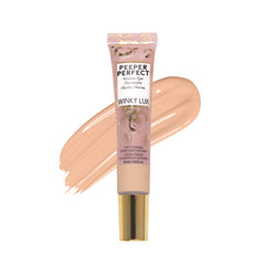 Winky Lux Peeper Perfect concealer tube dispensing precise shade for quick under-eye touch-ups.